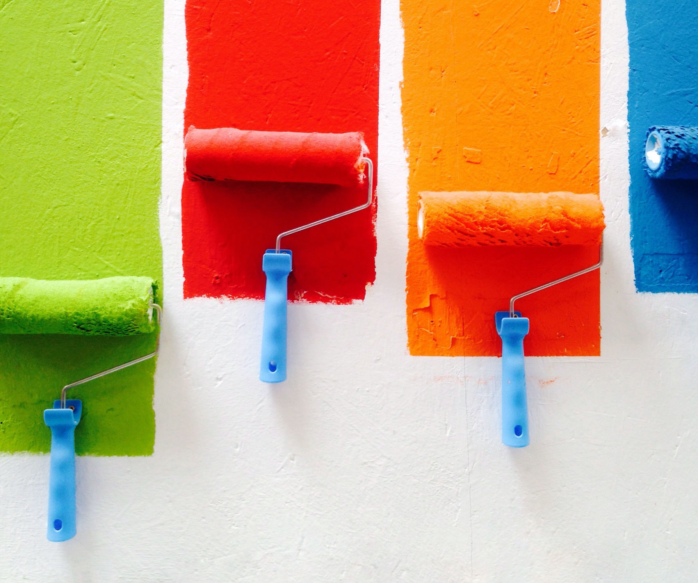 Professional painter applying premium Polisan paint